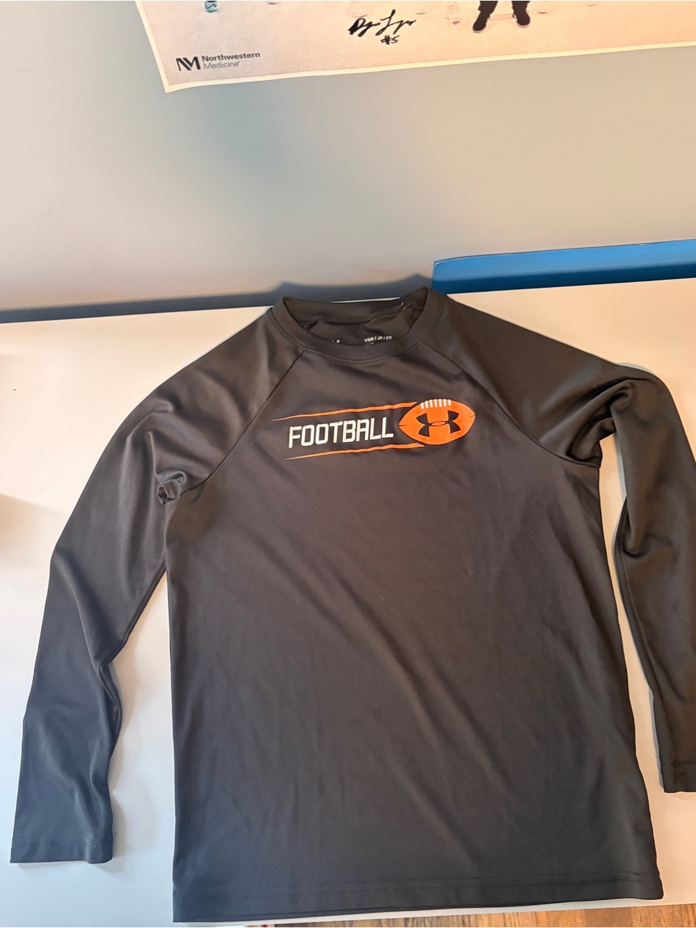 Under Armour Black Long Sleeve Football Performance Shirt with Orange Logo